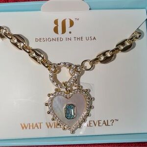 BP Gold Necklace with Blue Gem Heart Pendant